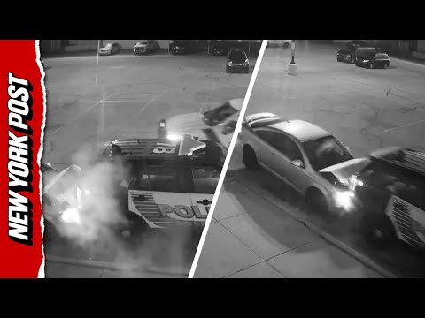 Knife-Wielding Man SLAMS Into Back of Police Car in Bizarre Moment