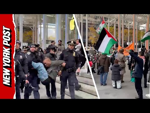 Protesters Dragged Away Outside of the Midtown Manhattan Apple Store