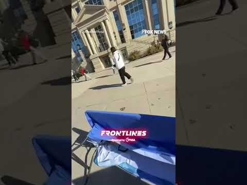 SEE IT: Student arrested for flipping Turning Point USA table after doing the same to YAF #shorts