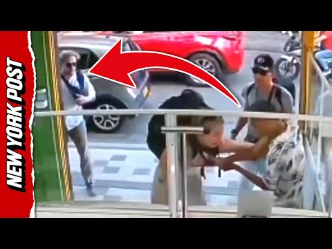 Watch Man Hide Behind Wall While Female Companion Fights Armed Robber Alone