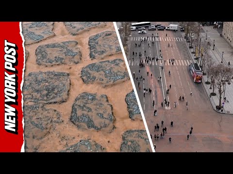 Climate Activists ARRESTED for Painting Around the Arc de Triomphe in Paris