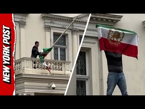 Iranian Flag RIPPED Down During Protest at London Embassy