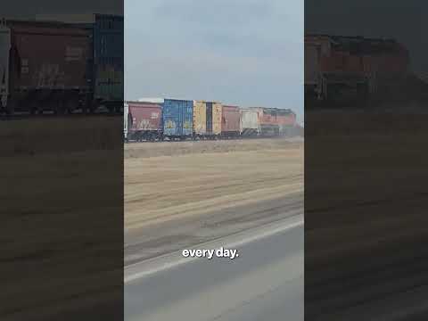 Driver Shocked When Freight Train Obliterates Stalled Trailer, Dragging it Along the Tracks #shorts