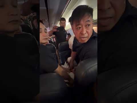 Unreal Moment Passenger Attempts To Open Emergency Exit Door Mid-Flight #shorts