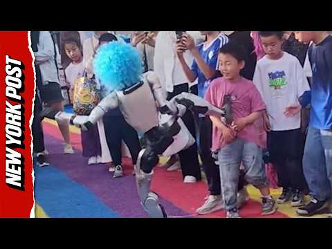 Martial Arts Performing Robot Kicks Boy in the Stomach