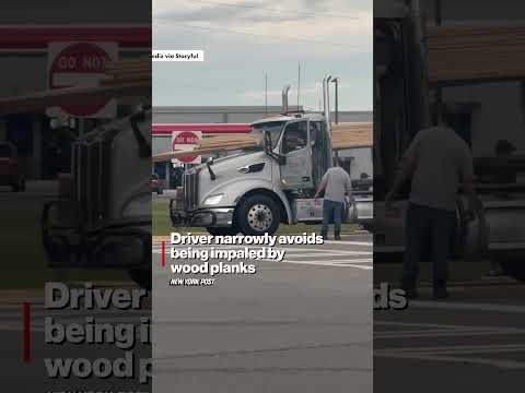 Driver Narrowly Avoids Being IMPALED by Wood Planks #shorts