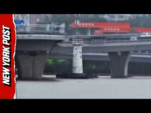 Lighthouse Swept Down River Destroys Power Lines Amid Devastating Floods in China