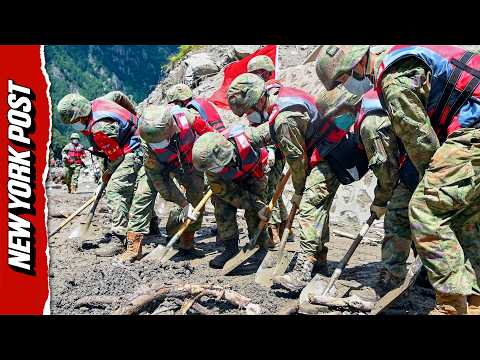 Chinese Rescue Crews Trudge Through Treacherous Terrain For Survivors