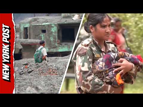Survivors of Deadly Nepal Mudslide Wander Somberly Through Their Once Vibrant Street