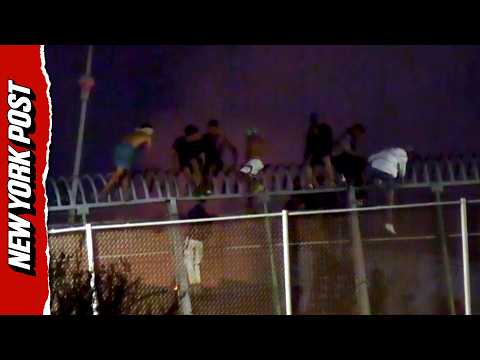 Insane Footage Shows Migrants Scaling Border Fence in Melilla, Spain