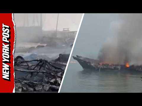 Charred Vessels Still Burning After Houthi Missile Strike on Yemen Port