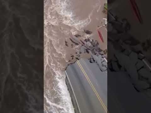 Raging floodwaters wash away road in historic Indiana flooding #shorts