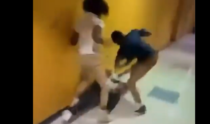 Absolutely HORRIFYING footage has emerged as Black students BRUTALLY BEAT a White student in the halls of the school.
