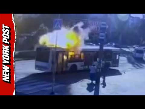 Surveillance Footage Captures Moment Russian Drone Strikes Ukrainian Bus Leaving Five Hospitalized