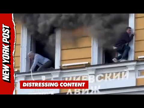 People Cling to Window Ledges as Russian Drone Strike Sets Kyiv Research Building Ablaze