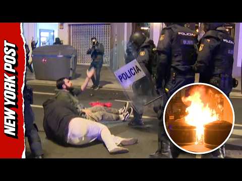 Police Strike Protesters With Batons as Streets Set Ablaze in Spain