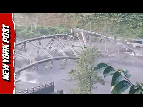 Shocking Video Captures Bridge Collapsing as Massive Floodwaters Tear Through Nepal