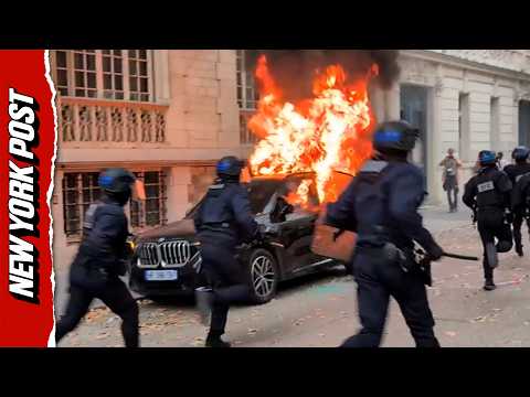 Central Paris Clashes: Student Protesters Torch Cars in Chaotic Street Battle With Police